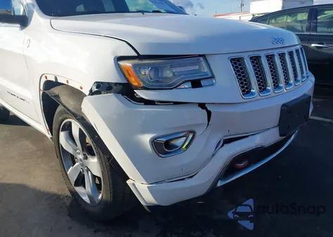 2014 Jeep Grand Cherokee Overland из США, поврежденный, VIN 1C4RJFCG5EC120981